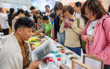 让文物焕发新光彩，周口店遗址开展非遗文化体验活动