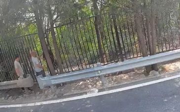 视频丨锯断铁网、强掰围栏，两人强闯十三陵水库被拍个正着