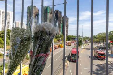 香港大火之下，风暴眼中的竹棚工