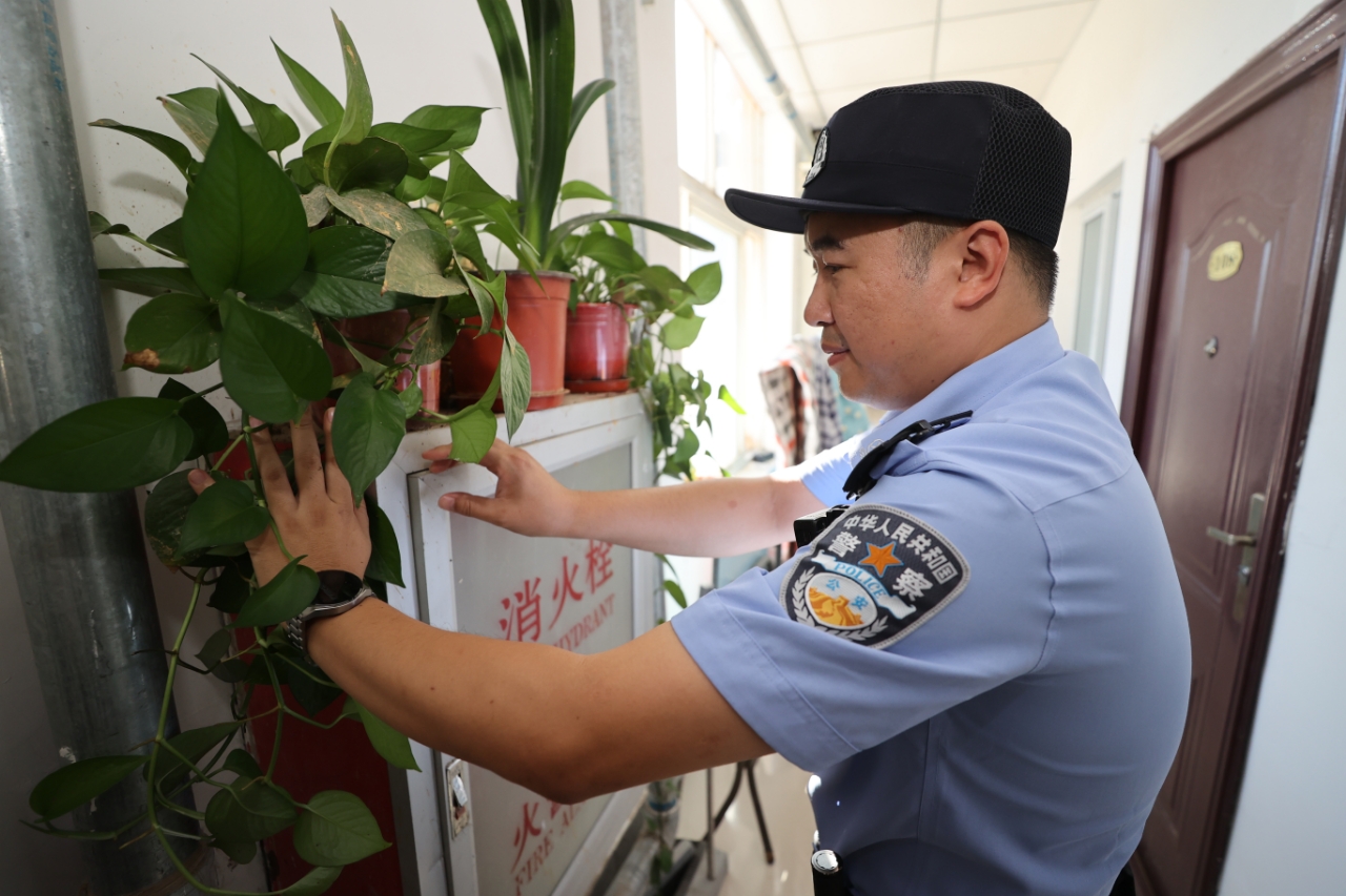 “照片警察” Wei Zheng：要在社区工作中做得很好