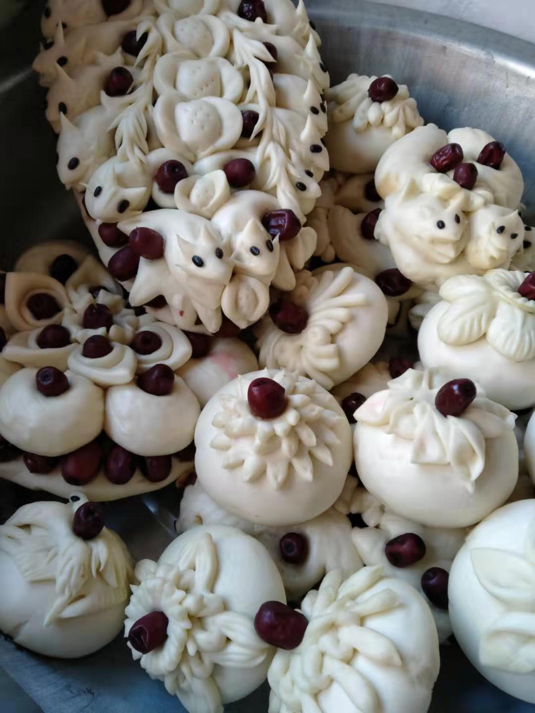 山西定襄花馍匠人做春节特制枣山腊月档期已排满